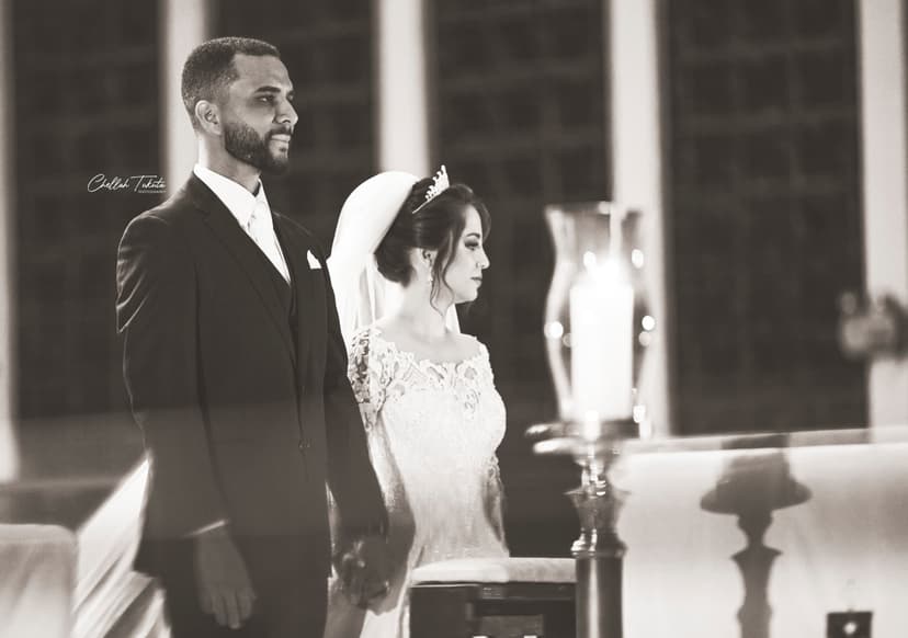 Artistic black and white ceremony portrait of couple during wedding service