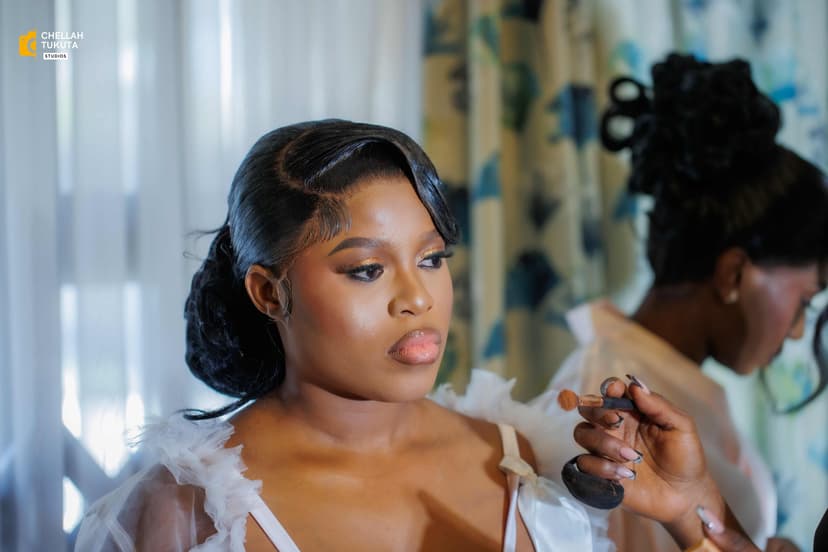 Bride getting makeup applied