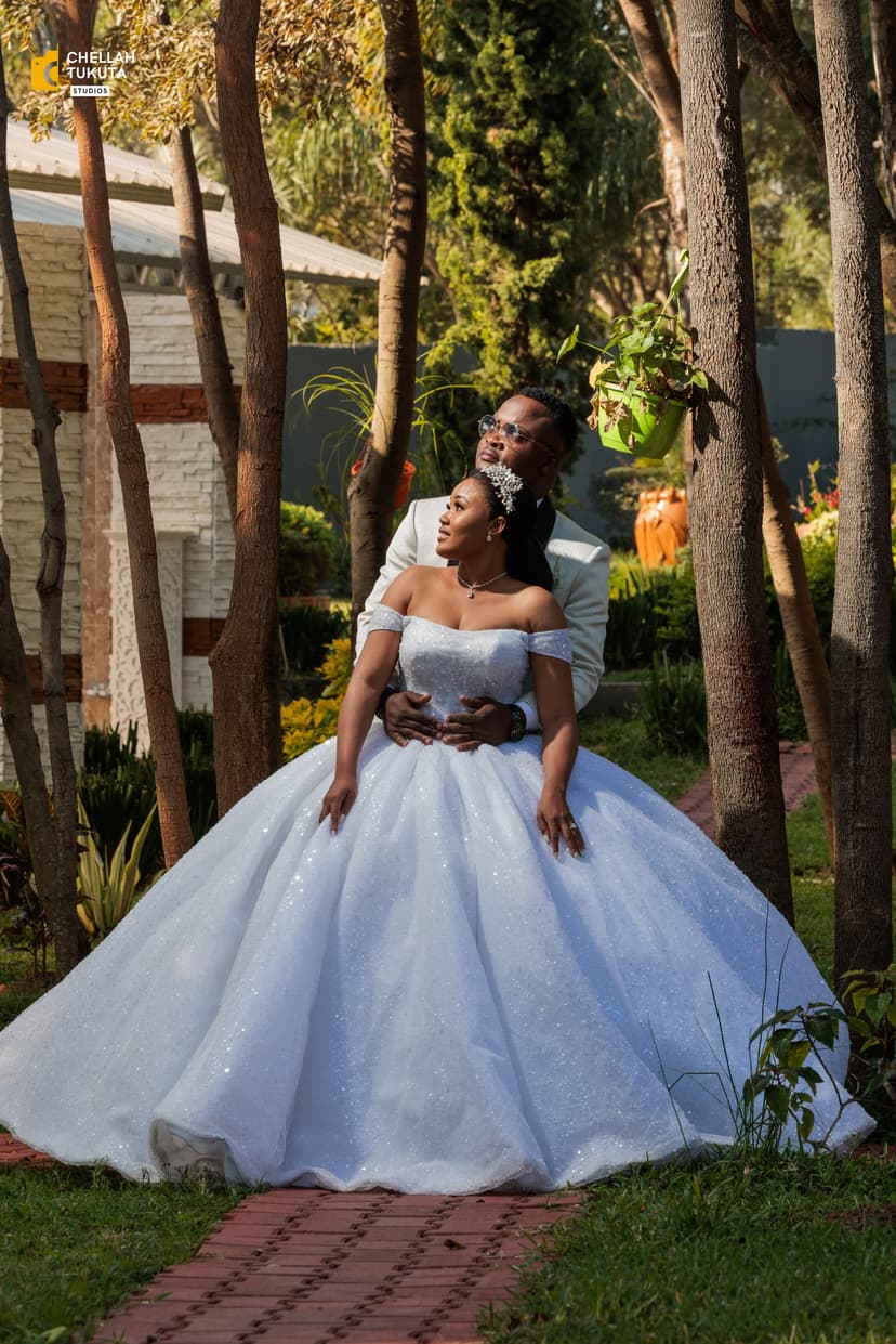 Romantic couple embrace in beautiful garden setting